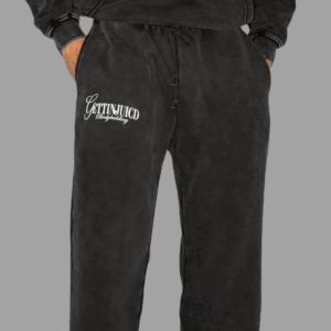 Model wearing black tapered gym joggers by GettinJuicd — stylish and functional men’s jogging bottoms for gym and lifestyle wear