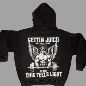 Flat lay of Angels Strength workout hoodie for men with graphic back print and acid-wash finish.