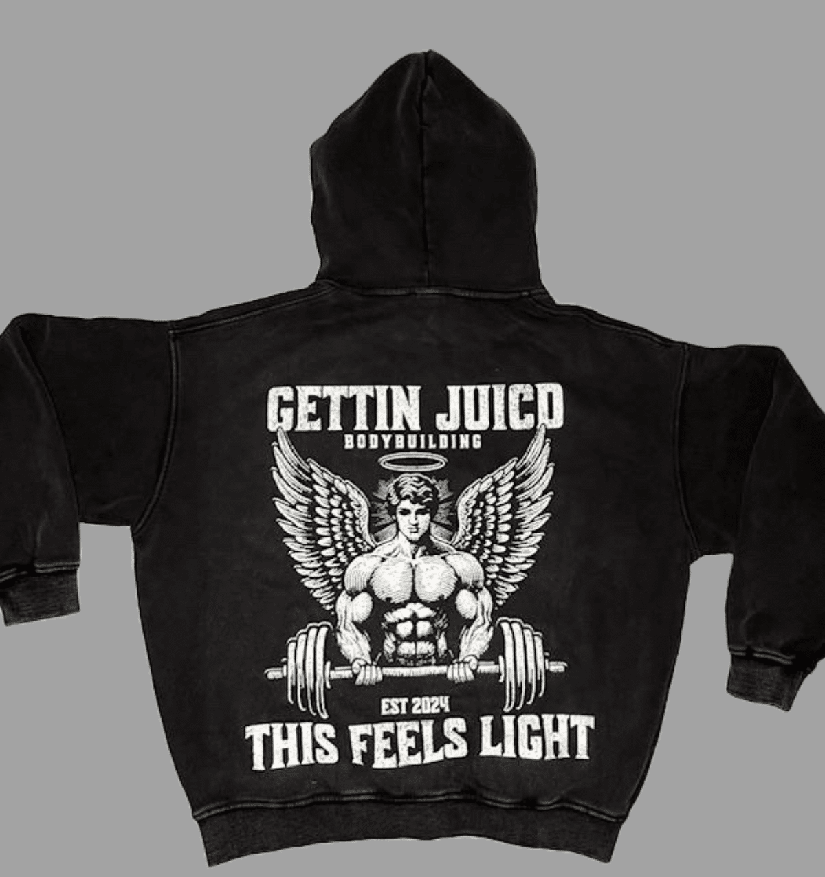 Flat lay of Angels Strength workout hoodie for men with graphic back print and acid-wash finish.