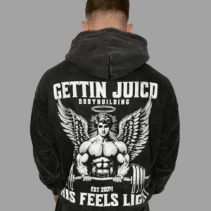 Model wearing Angels Strength men’s gym hoodie with winged bodybuilder graphic and ‘This Feels Light’ slogan.