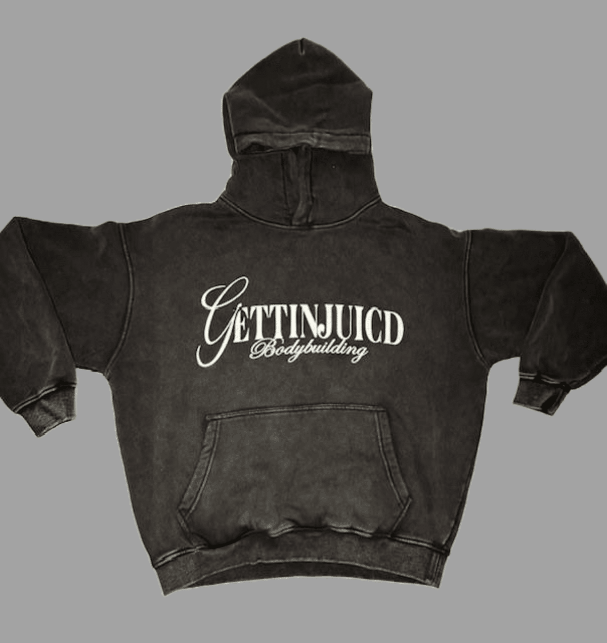Flat lay of Angels Strength hoodie showing GettinJuicd Bodybuilding front logo on faded black cotton.
